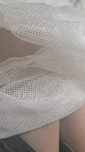 长期出售做渔网下来的涤纶网格布，涤纶布，现货2吨左右