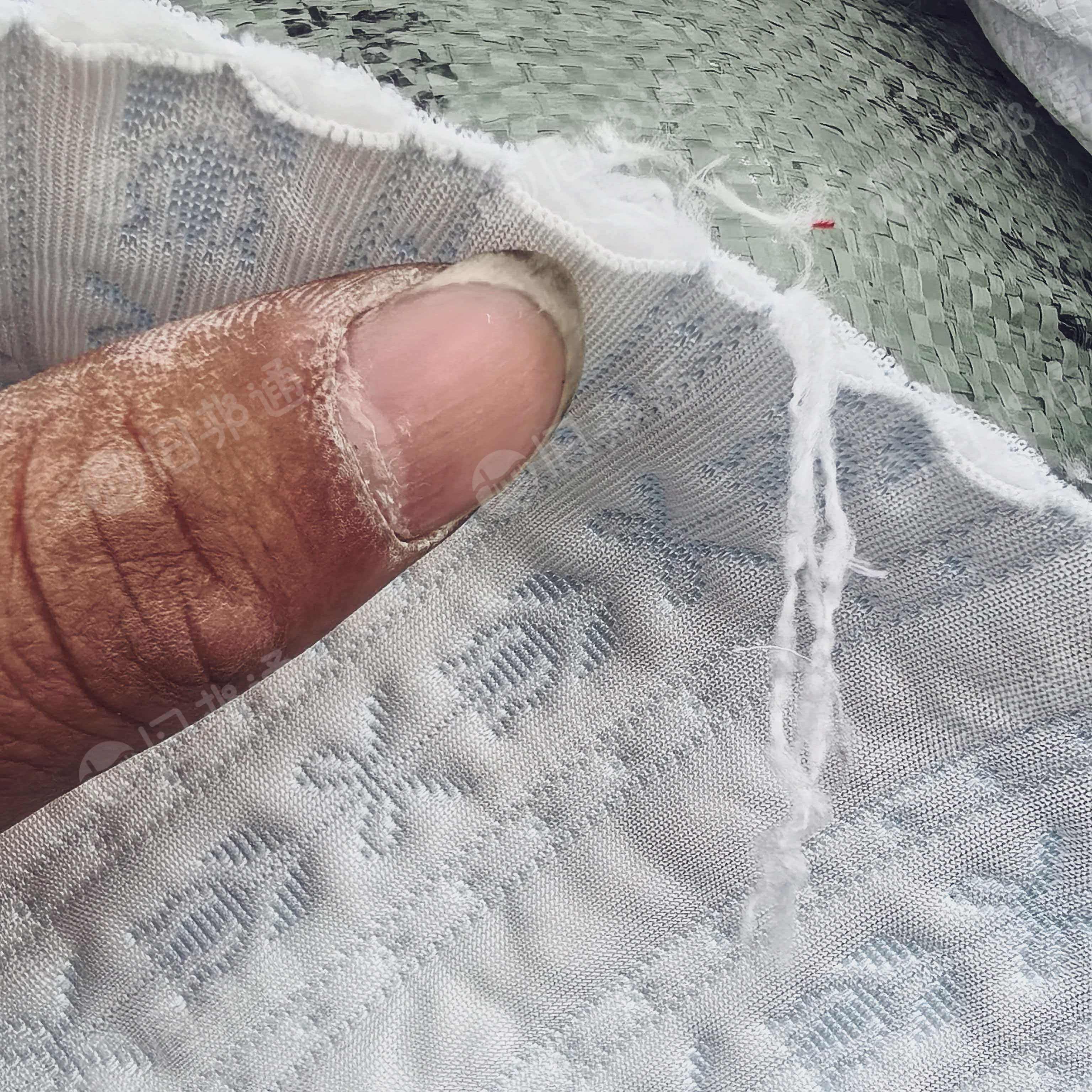 长期出售涤丙复合布涤纶复合丙纶，家纺厂下来的，含涤纶80左右，每个月有200多吨