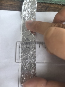 出售天戈能源下来的白边铝箔，含铝70多，现货70吨