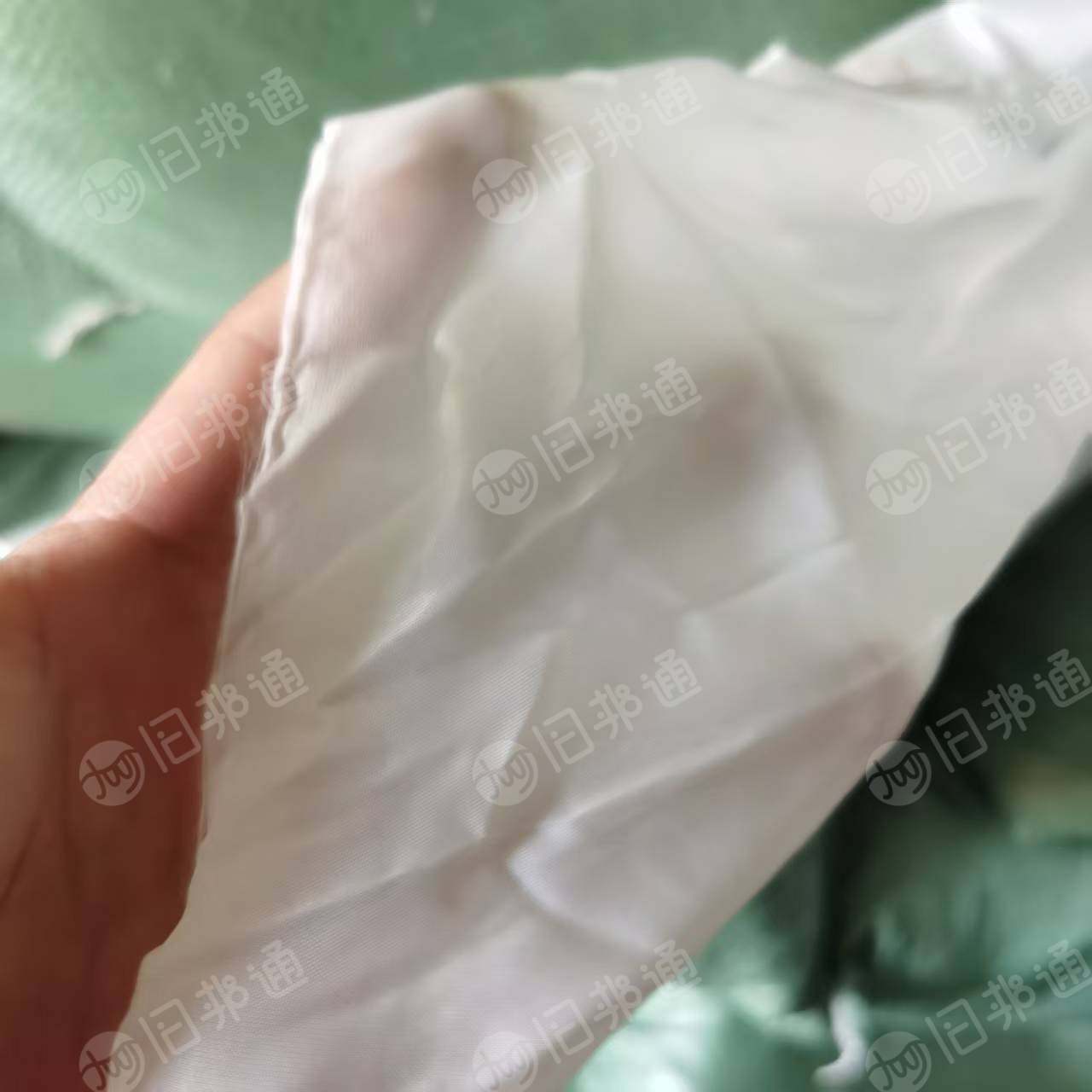 长期出售织布厂下来的白色涤纶坯布,涤纶布块,1米到5米都有,可以开花造粒,现货有18吨