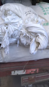 长期出售针织全棉漂白废布，漂白布，漂白开花料，月供十几吨，货在江苏苏州