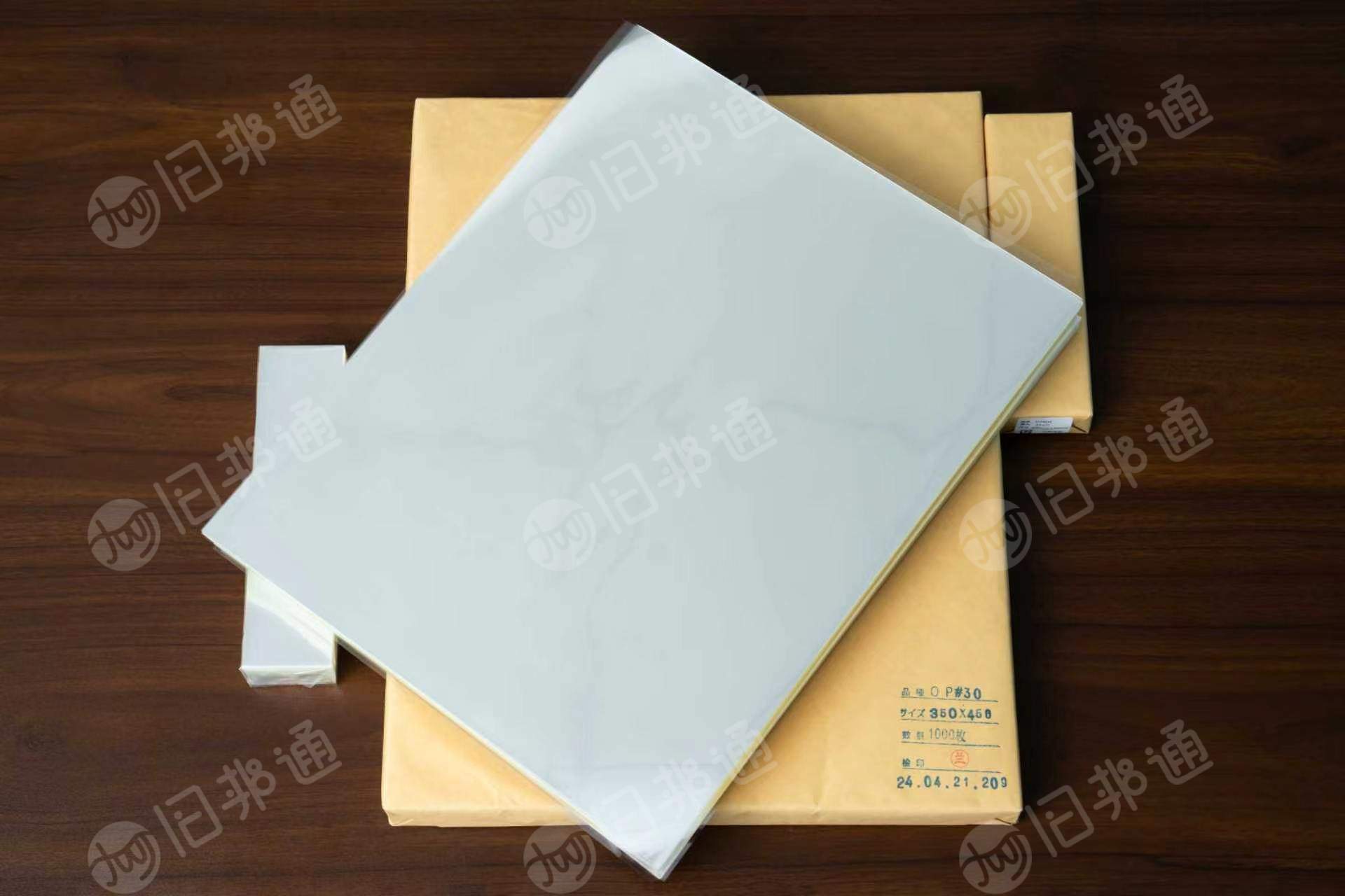 出售BOPP卷膜和片材，500米长度，打包好的，总共50吨左右