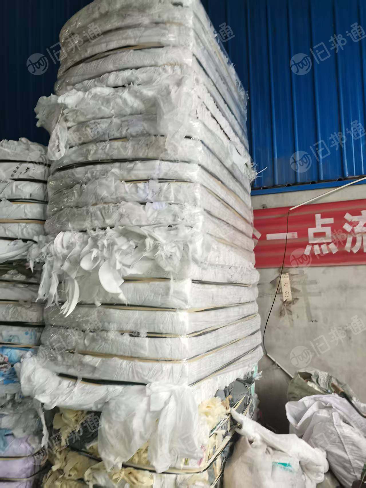 出售箱包厂下来的白色纯pp无纺布和高压膜，月供40吨
