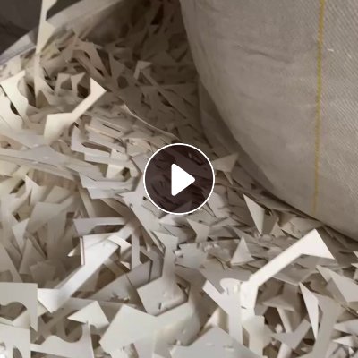 厂家处理白卡纸边角料，带一层膜，每个月十几吨