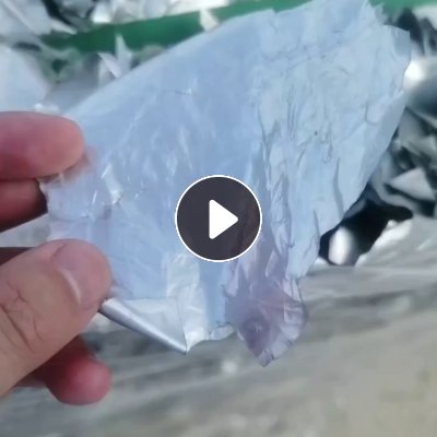 出售铝箔袋洗干净粉碎打包好的，铝塑膜破碎料，现货100吨