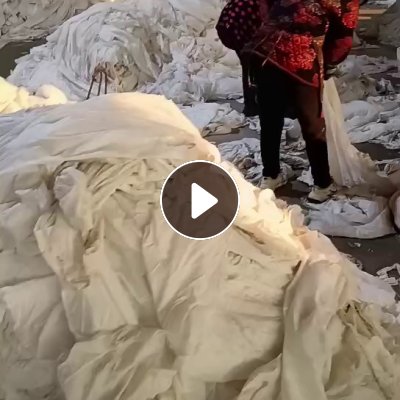 长期大量出售磨毛厂下来的白色纯涤纶废布，涤纶边角料，涤纶布块，含水量百分之二十，现货几十吨