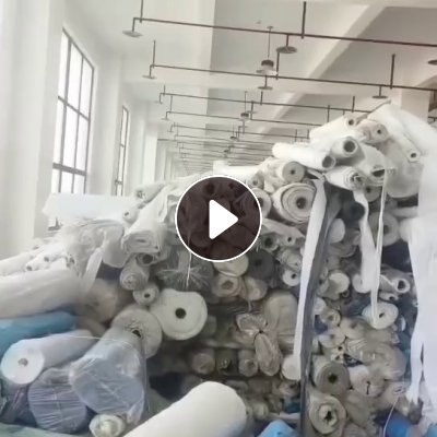 出售挂浆的库存无纺布，无纺布卷材，做衣服内衬用的，蓝色，白色都有，现货9.6米两车