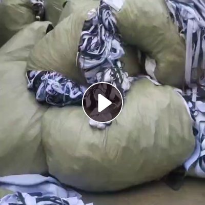 长期出售鼠标垫边角料，鼠标垫废料，一层布一层橡胶，月供300吨