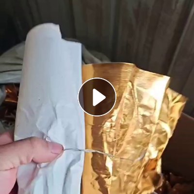 纸厂处理一批卷筒覆膜金纸，瑕疵品