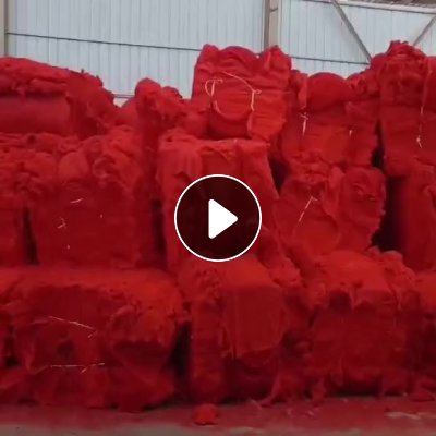 长期出售红灯笼下脚料开出来的红色纯涤纶开花棉，现货30-40吨，厂在河南焦作