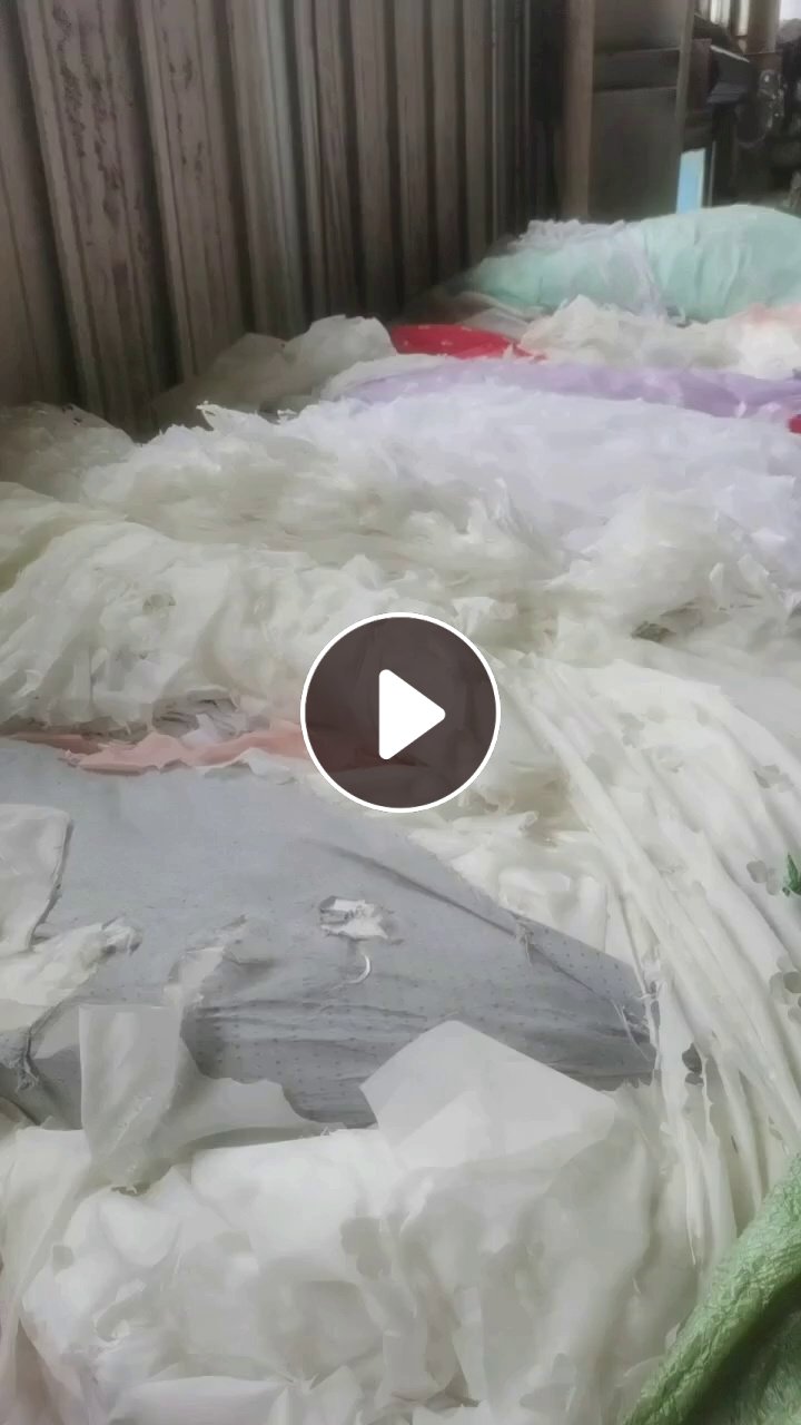 长期出售绣花厂下来的白色废布统货，纯涤纶废布，还有带浆的涤纶废布，麻棉，可开花用，现货80吨左右