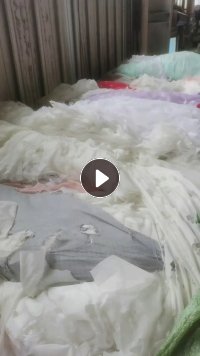 长期出售绣花厂下来的白色废布统货,纯涤纶废布,还有带浆的涤纶废布,麻棉,可开花用,现货80吨左右