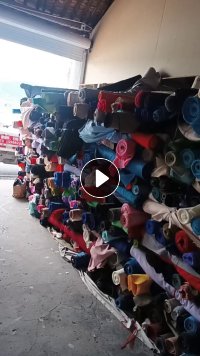 长期出售箱包布，箱包大小卷布，门幅1.5，带点轻桨，月供20吨，货在浙江绍兴