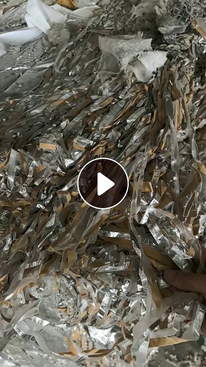 出售铝箔纸废料，一层铝一层纸，铝含量50%左右