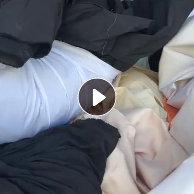 长期出售杂色的涤纶大块布，涤纶浆布，涤纶开花料，涤纶废布，月供50吨