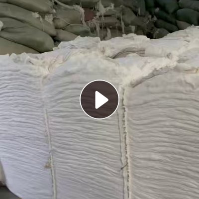 长期大量出售涤纶废丝氨纶包覆丝开出来的开花棉，现货100多吨，货在新疆阿克苏