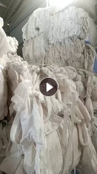 长期出售针刺厂下来的腈纶含10%的丙纶无纺布，腈纶复合开花料，现货十六吨