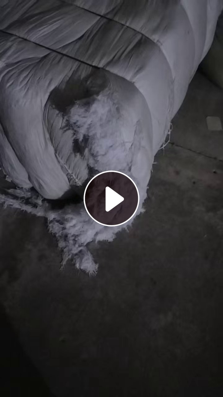 长期出售和漂白废布打包在一起的，漂白开花料，含棉85%左右，月供30-40吨，货在江苏常州