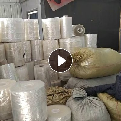 大量出售PET带胶膜废料，上面一点一点的是胶，现货50吨左右