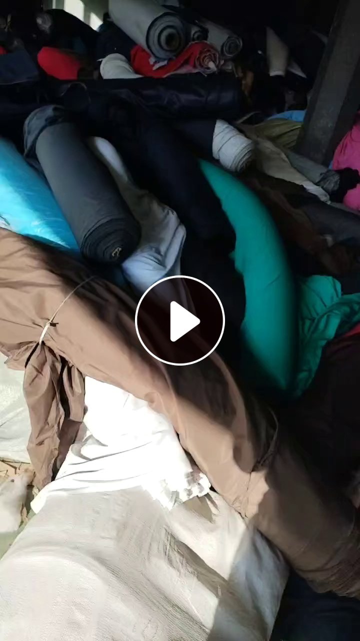 大量出售服装厂，鞋厂，复合汽车座椅厂剩下来的库存布，处理布，种类繁多，货在山东青岛