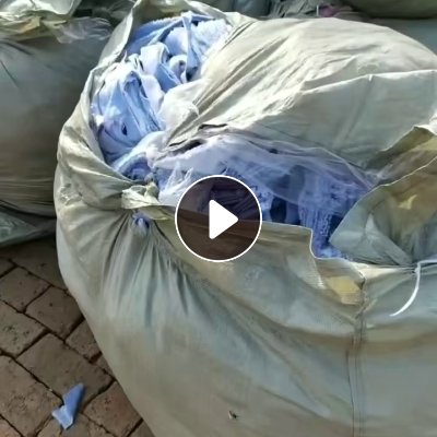 长期大量出售涤纶废布，涤纶布条，每一根两百米长，带浆的，可以做打绳用，现货50吨左右