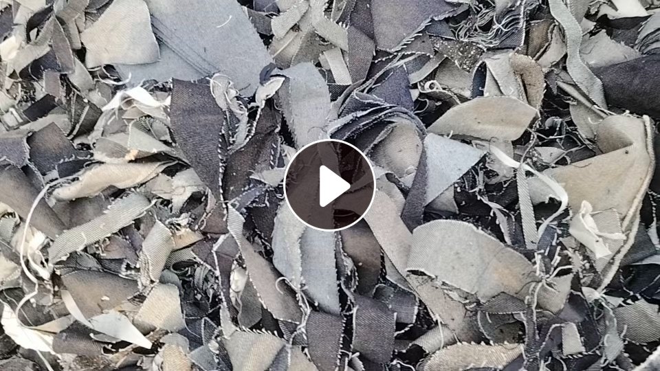 长期出售95棉牛仔废布，牛仔边角料，现货60吨左右