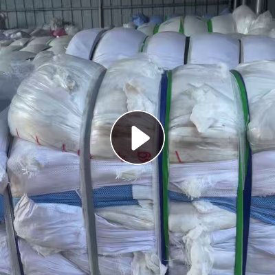 长期出售白色羊毛衫下脚料，羊毛衫边角料，可开花做无纺布用，月供100吨