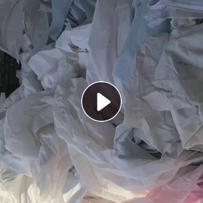 长期出售制衣厂下来的白烟废布，锦纶废布，氨纶废布，涤纶废布，无纺布，开花料，月供200吨