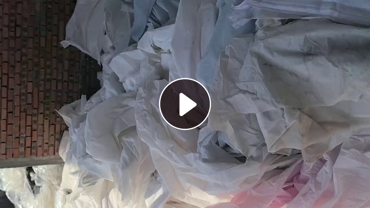 长期出售制衣厂下来的白烟废布，锦纶废布，氨纶废布，涤纶废布，无纺布，开花料，月供200吨