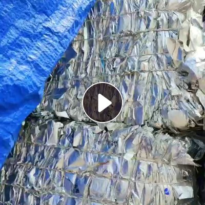 出售铝塑膜，复合厂边角料和电子厂的报废包装袋压包的，含铝13左右，月供200吨