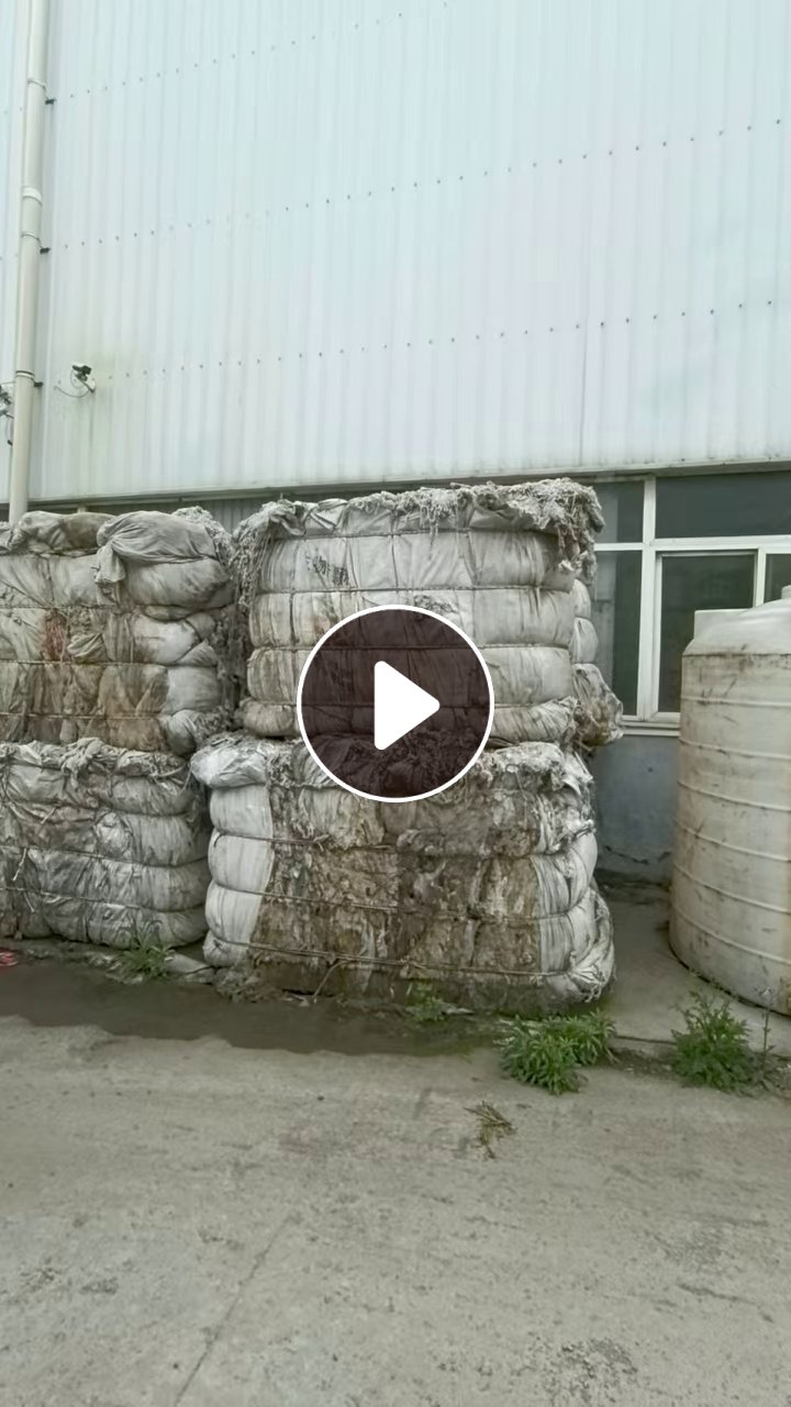 出售氨纶脱水丝挑下来的垃圾料，黑料，现货30多吨，货在河南信阳