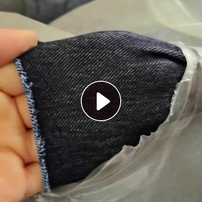 现货出售20吨针织牛仔布，涤棉大布块5-10米打成卷的，喜欢的老板联系