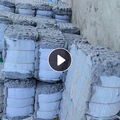 长期出售灰色85棉开花棉，可以纺手套纱用，便宜卖，现货600吨左右，货在河南商丘