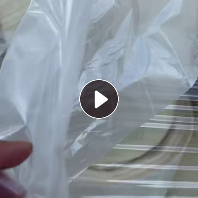 出售PET膜废料，一层pet奶白膜一层胶水料，现货33吨