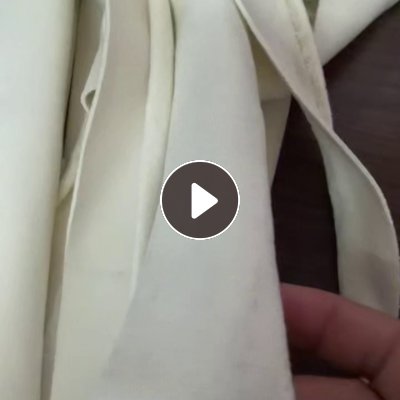 出售做裤子下来的米黄色化纤废布，拉丝布，现货10多吨，货在江西抚州